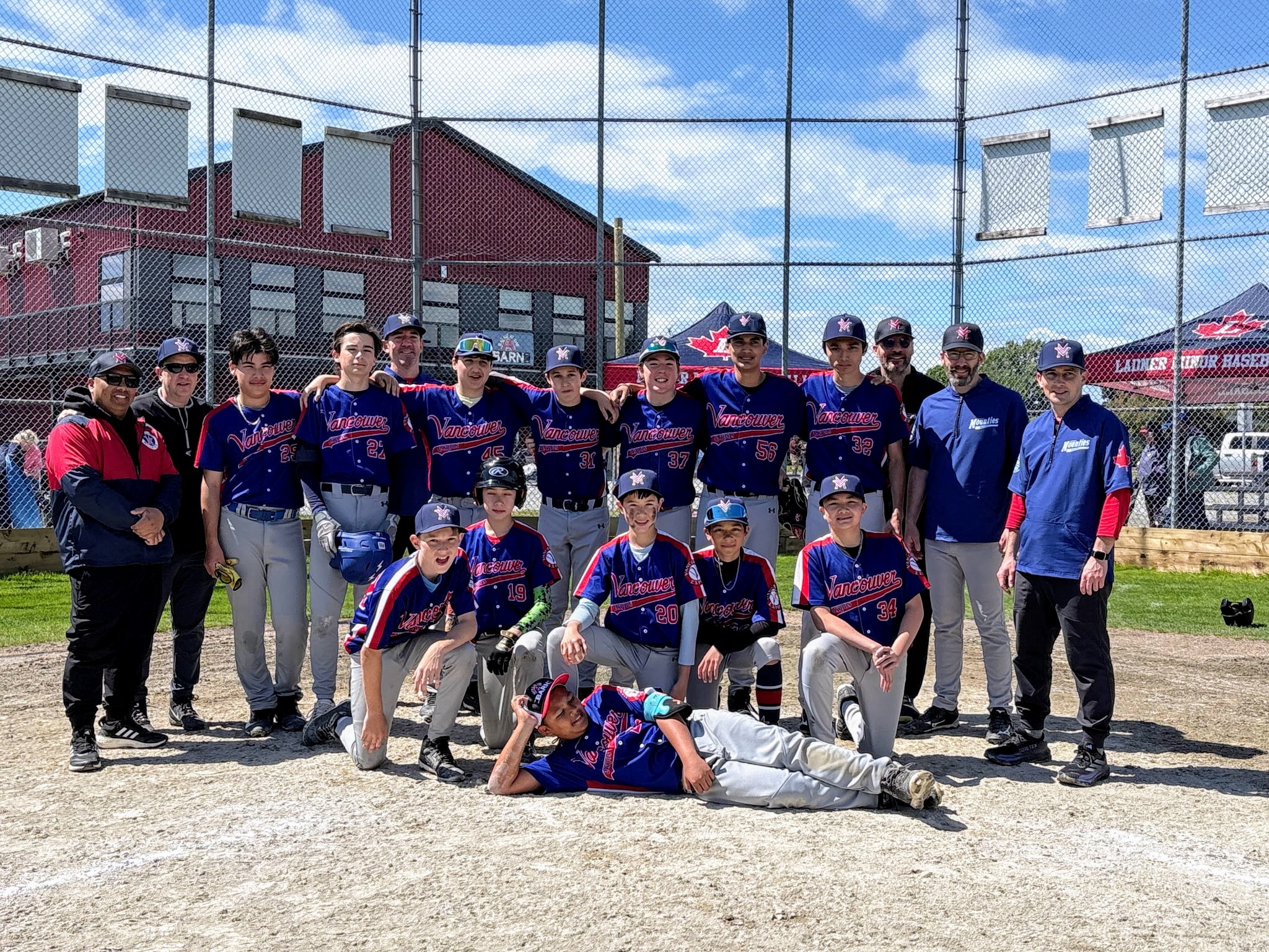 15U A Expos posing with third place plaques from the Battle At The Barn tournament.